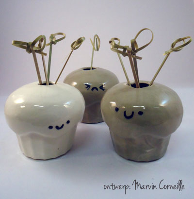 stenen opberg cupcakes met gezichtjes, ontwerp van Marvin Corneille